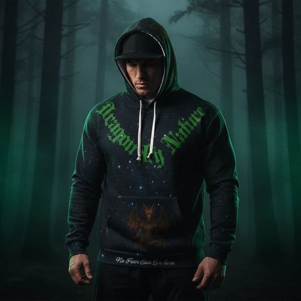 Person wearing a dark dragon hoodie with green text in a forest setting