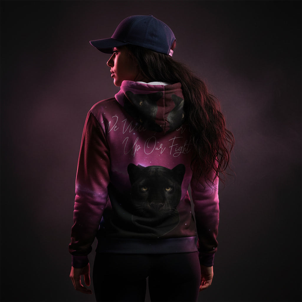 Person wearing a hoodie with a panther design and text on the back against a dark background