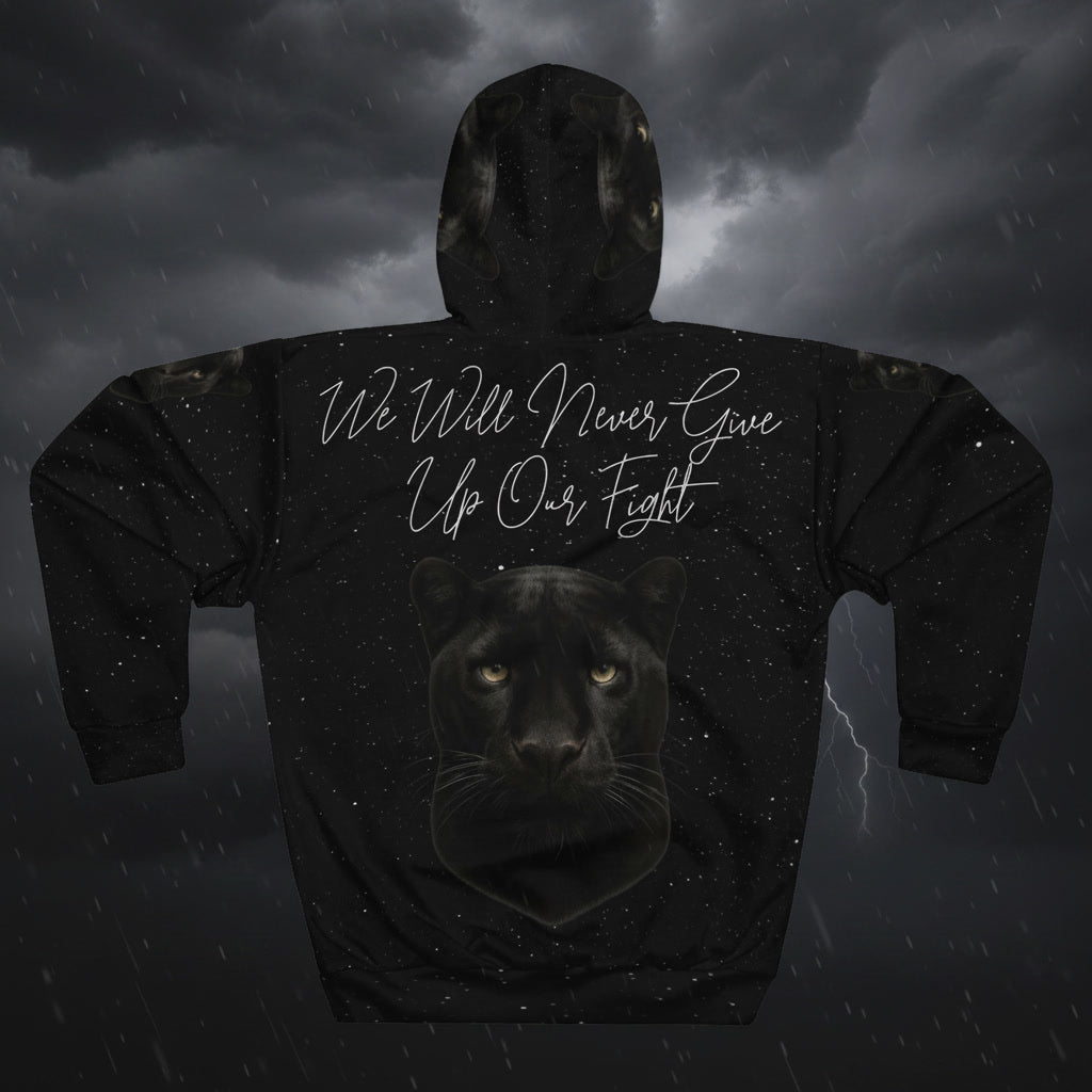 Black hoodie with panther design and text against a dark, stormy sky